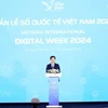 Minister of Information and Communications Nguyen Manh Hung speaks at the event. (Photo: VNA)