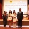 Third prize winners honoured (Photo: VNA)