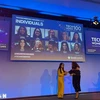 Dr Nguyen Thuy Ba Linh (yellow long dress) from University College London (UCL) becomes the first Vietnamese scientist to win the UK's TechWomen 100 Awards. (Photo: VNA)