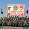 Vietnamese officers and soldiers attending VINBAX 2024 pose for a group photo. (Photo: VNA)