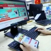 E-commerce is expanding rapidly and has become a popular business method recognised by both enterprises and the public in Vietnam (Photo: VNA)