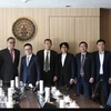 A delegation of the Vietnam Journalists Association pose for group photo with Thai Deputy Foreign Minister Russ Jalichandra (Photo: VNA)