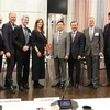 Deputy Prime Minister Tran Hong Ha (sixth from right) posing for a photo with leaders from Confederation of Danish Industry (DI) members (Photo: VNA)