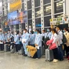 Labourers taking a Korean test before travelling to the RoK for working (Photo: VietnamPlus