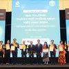 Representatives of 10 cities receiving the Smart City Award 2024. (Photo: VNA)