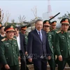 Party General Secretary To Lam (centre), who is also Secretary of the Central Military Commission, visits the Vietnam Military History Museum in Hanoi on December 3 (Photo: VNA)