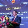 Vice Chairman of the provincial People’s Committee Doan Thanh Son speaks at seminar on developing cross-border e-commerce (Photo: VNA)