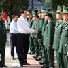 State President Luong Cuong visits officers and soldiers of the Bat Mot Border Guard Station in Thanh Hoa province. (Photo: VNA)