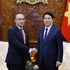 State President Luong Cuong (R) receives Algerian Ambassador to Vietnam Sofiane Chaib. (Photo: VNA)