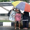 A homeless family is seen near the cart where they sleep, in Cibinong, Bogor Regency, West Java, on April 15, 2022 (File photo: Antara)