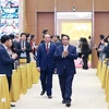 Prime Minister Pham Minh Chinh attends the culture, sports, and tourism sector's conference (Photo: VNA)