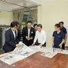 Representatives of the Thai Journalists Association visit the printing house of Vinh Phuc Newspaper on August 14. (Photo: VNA)