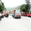 Ceremonia para recibir restos de mártires, combatientes voluntarios y expertos vietnamitas caídos en Laos. (Foto: baonghean.vn)