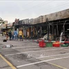 Según los gestores del centro comercial, el incendio se produjo a la 1:00 (hora local) del 10 de junio en un puesto de venta de alimentos y bienes de consumo. (Foto: VNA)