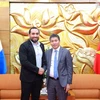 El presidente de la VUFO, Phan Anh Son (derecha), y el embajador de Nicaragua en Vietnam, Armengol Campos. (Foto: Nhan Dan)