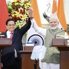 El primer ministro de Vietnam, Pham Minh Chinh (izquierda), y su homólogo de la India, Narendra Modi. (Foto: VNA)