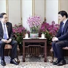 El presidente de la Asamblea Nacional de Vietnam, Tran Thanh Man (izquierda), y el primer ministro de Singapur, Lawrence Wong (Foto: VNA)