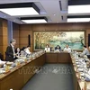 越南第十五届国会第八次会议就医保政策进行讨论。图自越通社