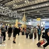 Passagers à l’aéroport de Suvarnabhumi, en Thaïlande. (Photo : VNA)