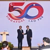 Le Premier ministre singapourien Lawrence Wong (à droite) et son homologue lao Sonexay Siphandone (Photo : Straitstimes)
