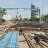 Sur le chantier de construction du projet de tunnel d'intersection Nguyen Van Linh-Nguyen Huu Tho (Photo : journal Sai Gon Giai Phong)