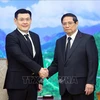 Le Premier ministre Pham Minh Chinh (droite) et Jakkapong Sangmanee, ministre attaché au cabinet du Premier ministre thaïlandais et envoyé spécial du Premier ministre thaïlandais. Photo : VNA