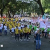 Plus de 5.000 personnes participent à une marche en soutien aux victimes de l'agent orange/dioxine à l'occasion du Mois d'action pour les victimes de l'agent orange/dioxine en août 2023. (Photo : VNA)