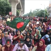 Manifestations au Bangladesh. Photo : Xinhua/VNA