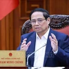 Le Premier ministre Pham Minh Chinh, chef du comité de pilotage pour la révision et le démêlage des nœuds dans le système des documents juridiques. Photo : VNA