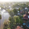 Une partie du village de Mai, dans le district de Luang Namtha, province de Luang Namtha, au Laos, est inondée après les pluies torrentielles provoquées par le typhon Yagi. (Photo : VNA)