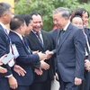 Le secrétaire général du Parti communiste du Vietnam et président de la République, To Lam (droite) rencontre des entrepreneurs vietnamiens. Photo : VNA