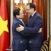 Le Premier ministre Pham Minh Chinh (gauche) rencontre son homologue égyptien Mostafa Madbouly à Riyad. Photo : VNA