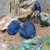 L'équipe de recherche de Nghe An découvre les restes de soldats volontaires et d'experts vietnamiens dans la province laotienne de Xiangkhouang. Photo : VNA