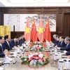 越南政府总理范明政与中国国务院总理李强举行了会谈