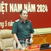 越南人民军副总参谋长冯士晋上将发表讲话。图自越通社