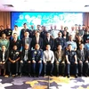 出席第14届东盟国家警察协会联络官会议的代表。图自越通社