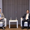 越南政府总理范明政会见三星集团总裁李在镕。图自越通社