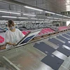 兴安省安美县安富纺织品服装公司生产链。图自越通社