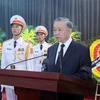 越共中央政治局委员、国家主席、治丧委员会主任苏林在追悼会上致悼词。图自越通社