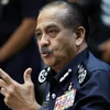 Malaysian Inspector General of Police Razarudin Husain said Jemaah Islamiyah 'paraphenalia' was found in a raid on the suspect's home. (File: Hasnoor Hussain/Reuters)