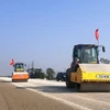 Workers are building a section of the eastern North-South expressway. (Photo: VietnamPlus) 