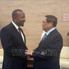 Vietnamese Prime Minister Pham Minh Chinh (R) and Prime Minister of Ethiopia Abiy Ahmed. (Photo: VNA)