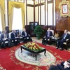6月17日，越南国家主席苏林在主席府接见了俄罗斯驻越南大使根纳季·别兹杰特科。图自越通社