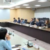 岘港市委书记阮文广一行与韩国仁川经济自由区领导举行工作会议。图自cadn.com.vn
