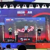 Male athletes with best performance at the 2024 VinFast IRONMAN 70.3 Vietnam receive awards. (Photo: VNA broadcasts)
