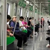 People on the Cat Linh-Ha Dong urban metro line in Hanoi. (Photo: VNA)