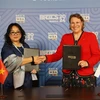Representatives from Vietnamese and Russian enterprises at the cooperation agreement signing ceremony within the framework of the BRICS Women’s Entrepreneurship Forum in Moscow. (Photo: VNA)