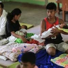 Evacuees rest inside an evacuation center set up at a school in a village in Canlaon, Negros Occidental province, central Philippines on June 4, 2024. (Photo: AFP) 