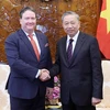 President To Lam (right) and US Ambassador to Vietnam Marc Evans Knapper. (Photo: VNA)