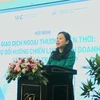 Ho Thi Quyen, deputy director of the Investment and Trade Promotion Centre of HCM City, speaks at the conference titled “Current Foreign Trade Transactions: Changes in Business Strategies and Disputes Management” in HCM City on July 5. (Photo: Courtesy of ITPC) 